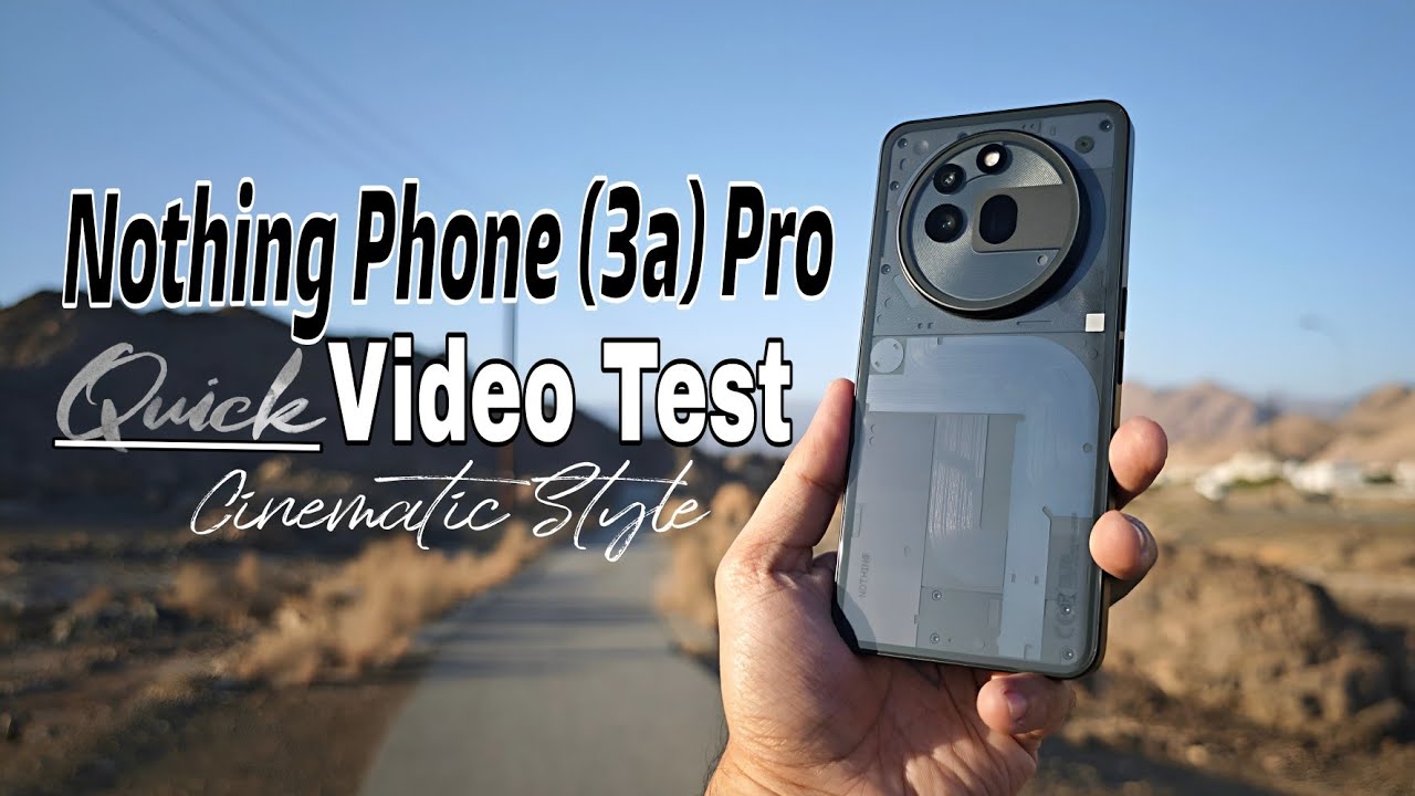 Hand holding Nothing Phone in landscape